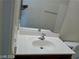 Bathroom featuring a single sink vanity, mirror, and toilet at 4085 Oliver Sagebrush Dr, Las Vegas, NV 89122
