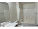 Bright bathroom featuring a vanity, toilet, and shower-tub combination at 4085 Oliver Sagebrush Dr, Las Vegas, NV 89122