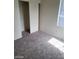 Bedroom with carpet, closet, and a window at 4085 Oliver Sagebrush Dr, Las Vegas, NV 89122