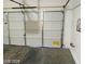 View of garage showcasing the door hardware and the cement flooring at 4085 Oliver Sagebrush Dr, Las Vegas, NV 89122