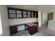 Spacious home office with custom built-in desk, cabinets and bookshelves, offering ample storage and workspace at 4085 Oliver Sagebrush Dr, Las Vegas, NV 89122