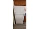 Classic white refrigerator with top and bottom freezer/fridge compartments and handles at 4085 Oliver Sagebrush Dr, Las Vegas, NV 89122