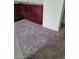 Carpeted room with built-in cabinets and drawers on the lower half of the wall at 4085 Oliver Sagebrush Dr, Las Vegas, NV 89122