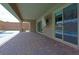 Covered patio with pavers and access to pool at 1140 Apollo Gardens St, Henderson, NV 89052