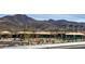 Community bocce ball court featuring covered seating with mountain views and well-maintained landscaping at 2881 Thunder Bay Ave, Henderson, NV 89052