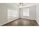 Well-lit bedroom with a window seat and wood-look floors at 3933 Edgemoor Way, Las Vegas, NV 89121