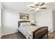 Bedroom features wood-look floors, a ceiling fan, and a closet at 3933 Edgemoor Way, Las Vegas, NV 89121