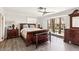 Main bedroom with a private balcony, wood-look floors, and furniture at 3933 Edgemoor Way, Las Vegas, NV 89121