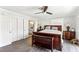 Main bedroom features wood-look floors, a sliding closet, and a bathrrom entrance at 3933 Edgemoor Way, Las Vegas, NV 89121