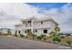 Modern two-story home with clean lines and desert landscaping at 7090 Fazio Dr, Las Vegas, NV 89110