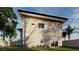 Modern two-story home exterior with a sleek design and beautiful backyard at 6503 Adrian Ridge Ct, Las Vegas, NV 89149