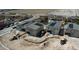 New home construction site featuring multiple homes with solar panels on the roof being developed at 6527 Adrian Ridge Ct, Las Vegas, NV 89149