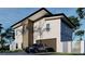 Rendering of home's exterior featuring a modern design, a gray car, and a fenced yard at 6527 Adrian Ridge Ct, Las Vegas, NV 89149