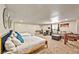 Large basement bedroom with two queen beds and a sitting area at 3784 Pama Ln, Las Vegas, NV 89120