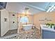 Elegant bathroom with soaking tub, walk-in shower, and patterned floor at 3784 Pama Ln, Las Vegas, NV 89120