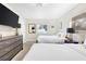 Bright bedroom with two double beds and a dresser at 3784 Pama Ln, Las Vegas, NV 89120