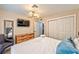 Comfortable bedroom featuring a dresser for storage and closet space at 3784 Pama Ln, Las Vegas, NV 89120