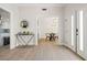 Bright and airy entryway with view to kitchen and dining area at 3784 Pama Ln, Las Vegas, NV 89120