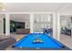 Pool table with a view of the open living space at 3784 Pama Ln, Las Vegas, NV 89120