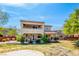 Two-story home with a spacious backyard, patio, and mature landscaping at 5301 Fairbranch Ln, Las Vegas, NV 89135