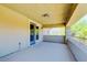 Charming outdoor balcony featuring a sturdy railing, overhead lighting, and relaxing green views at 5301 Fairbranch Ln, Las Vegas, NV 89135