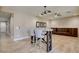 Dining area with bar-top table and stools, built in storage, and backyard views at 5301 Fairbranch Ln, Las Vegas, NV 89135