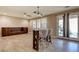 Dining area featuring a granite counter table, bar stools, and built in cabinet at 5301 Fairbranch Ln, Las Vegas, NV 89135
