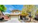 Charming two-story home showcasing a well-maintained lawn and welcoming front porch at 5301 Fairbranch Ln, Las Vegas, NV 89135