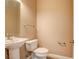 This powder room is equipped with a sink, toilet and a towel rack at 5301 Fairbranch Ln, Las Vegas, NV 89135