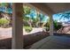 Covered patio overlooks a landscaped backyard with desert plants at 1335 Temporale Dr, Henderson, NV 89052