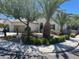 Beautiful two-story house with a landscaped yard and palm trees at 1335 Temporale Dr, Henderson, NV 89052