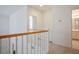 Upstairs hallway with access to bedrooms and bathroom at 1335 Temporale Dr, Henderson, NV 89052