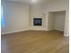 Living room with fireplace and light hardwood floors at 1335 Temporale Dr, Henderson, NV 89052