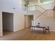 Two-story living room with high ceilings and hardwood floors at 1335 Temporale Dr, Henderson, NV 89052