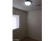 Bedroom featuring neutral carpet, window and ceiling light at 3505 Benson Ln, North Las Vegas, NV 89032
