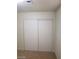 Bedroom closet with white sliding doors at 3505 Benson Ln, North Las Vegas, NV 89032