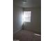 Bedroom with carpet, window and a standard closet at 3505 Benson Ln, North Las Vegas, NV 89032