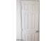 White six panel interior door with gold hardware at 3505 Benson Ln, North Las Vegas, NV 89032