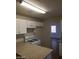 This kitchen has a countertop and an adjacent living space at 3505 Benson Ln, North Las Vegas, NV 89032