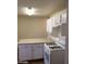 Open kitchen with countertop and white cabinets at 3505 Benson Ln, North Las Vegas, NV 89032