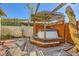 Outdoor hot tub with wood decking and a pergola offers a relaxing and private retreat at 4745 Desert Vista Rd, Las Vegas, NV 89121
