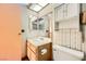 Bathroom featuring sink and vanity, toilet and enclosed shower at 4745 Desert Vista Rd, Las Vegas, NV 89121