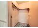 Walk-in closet providing storage with shelves and hanging rods at 4745 Desert Vista Rd, Las Vegas, NV 89121
