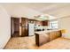 Eat-in kitchen with tile floors and a long countertop at 4745 Desert Vista Rd, Las Vegas, NV 89121