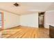 Open living area with wood flooring and access to backyard at 4745 Desert Vista Rd, Las Vegas, NV 89121
