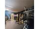 Spacious home gym, featuring weight rack, weights, benches and other fitness equipment at 4037 Gliding Gulls Ave, North Las Vegas, NV 89084
