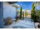 A view of the home's patio with seating and a gated garden area at 3301 Rodeo Ave, Pahrump, NV 89048