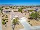 Single-story house in a residential neighborhood with solar panels at 3320 Kookaburra Way, North Las Vegas, NV 89084