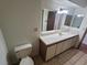 Bathroom with updated vanity and toilet at 1321 Del Mar St # 4, Las Vegas, NV 89119