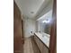 Clean bathroom with tiled floors, vanity, and toilet at 1321 Del Mar St # 4, Las Vegas, NV 89119